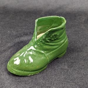 Antique majolica green glazed shoe signed Xmas 1910
